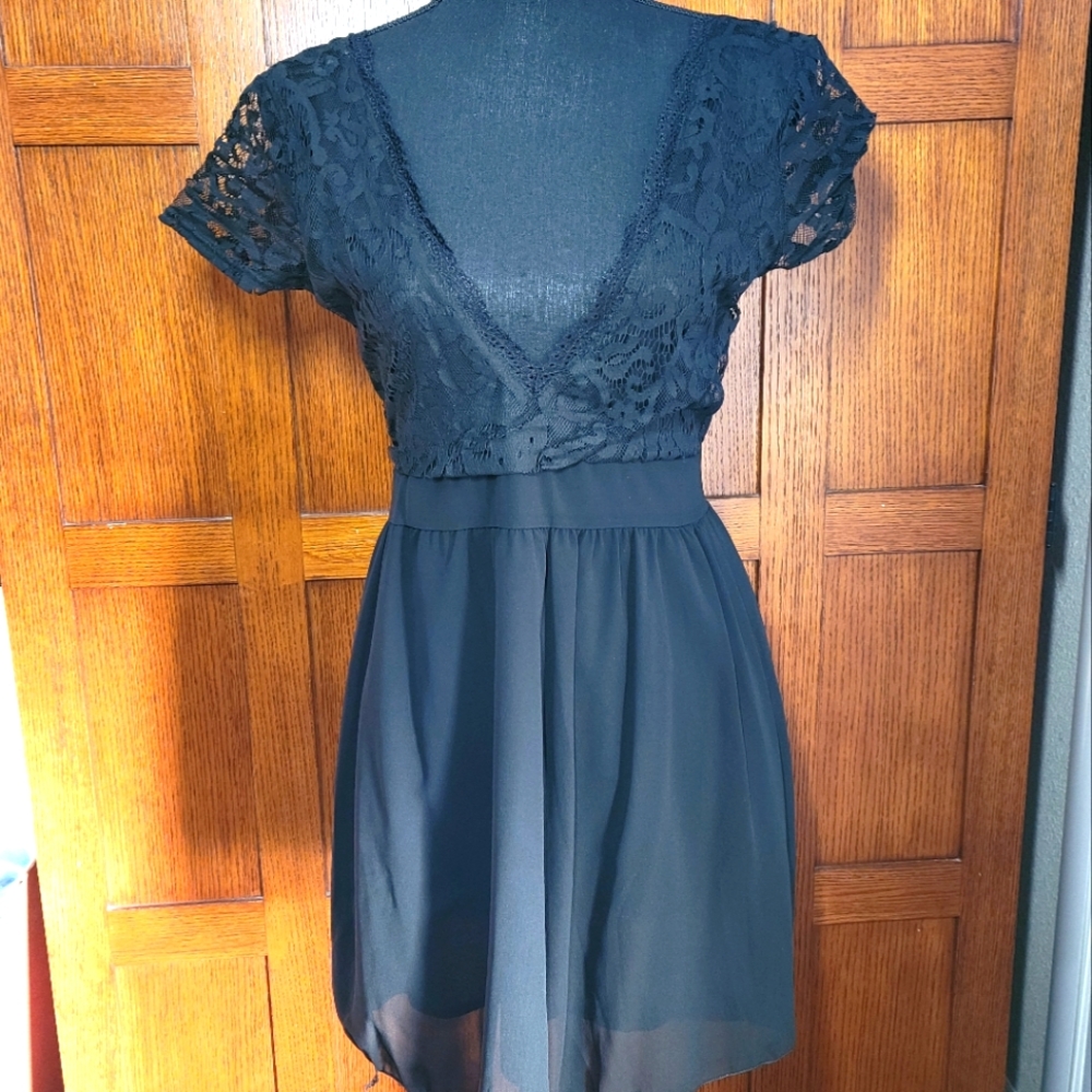 Black low cut front and back mini dress